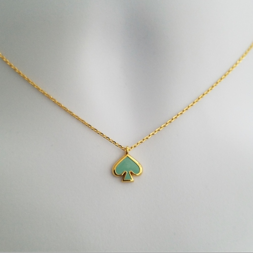 Kate spade necklace with gold and green detailing